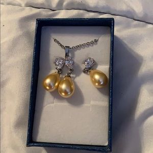 Yellow pearl and cubic zirconia set